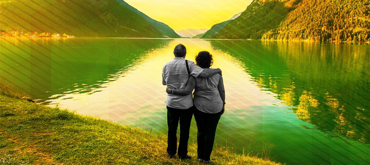 A couple at a lake.