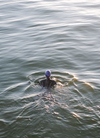 Woman wild swimming