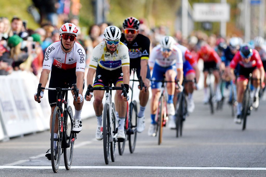 MANOSQUE FRANCE FEBRUARY 12 Bryan Coquard of France and Team Cofidis reacts after cross the finishing line in first place ahead of Julian Alaphilippe of France and Team QuickStep Alpha Vinyl Brown Points Jersey and Filippo Ganna of Italy and Team INEOS Grenadiers Black Leader Jersey during the 6th Tour de La Provence 2022 Stage 2 a 1806km stage from Arles to Manosque 417m TDLP22 on February 12 2022 in Manosque France Photo by Luc ClaessenGetty Images