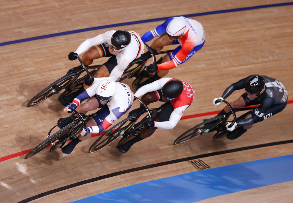 IZU JAPAN AUGUST 07 Maximilian Levy of Team Germany and Jason Kenny of Team Great Britain sprint ahead of Rayan Helal of Team France Kwesi Browne of Team Trinidad And Tobago and Sam Webster of Team New Zealand during the Mens Keirin first round heat 1 of the track cycling on day filthen of the Tokyo 2020 Olympic Games at Izu Velodrome on August 07 2021 in Izu Shizuoka Japan Photo by Justin SetterfieldGetty Images