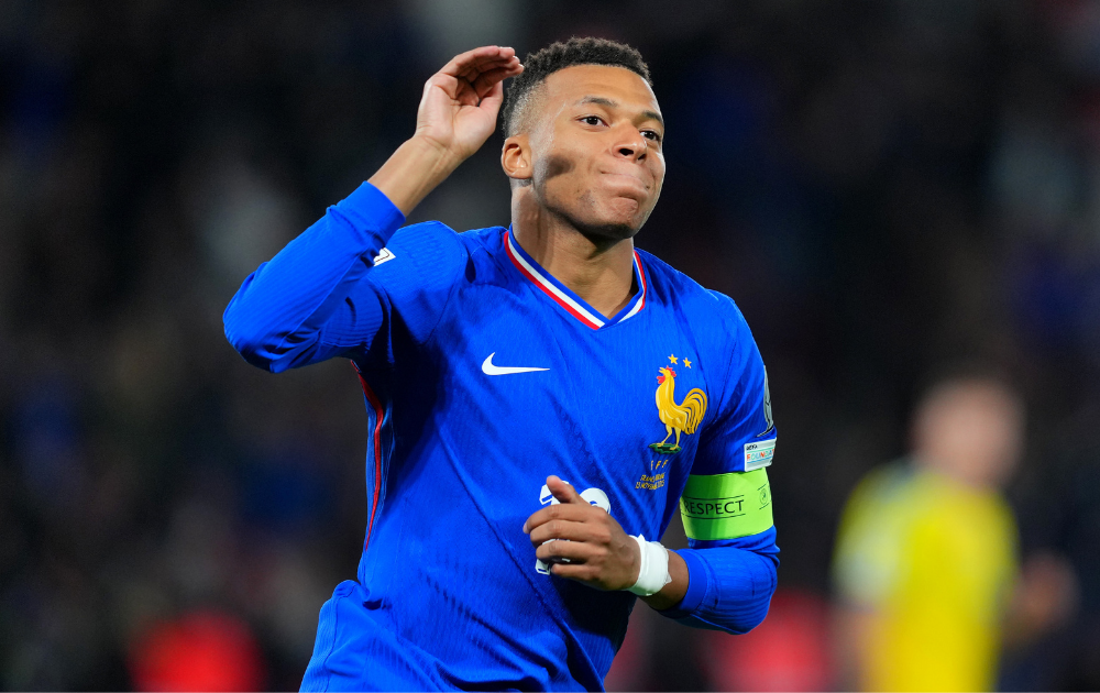 Kylian Mbappe of France celebrates scoring his team's first goal from the penalty spot during the FIFA World Cup 2026 qualifier match between France and Ukraine at Parc des Princes on November 13