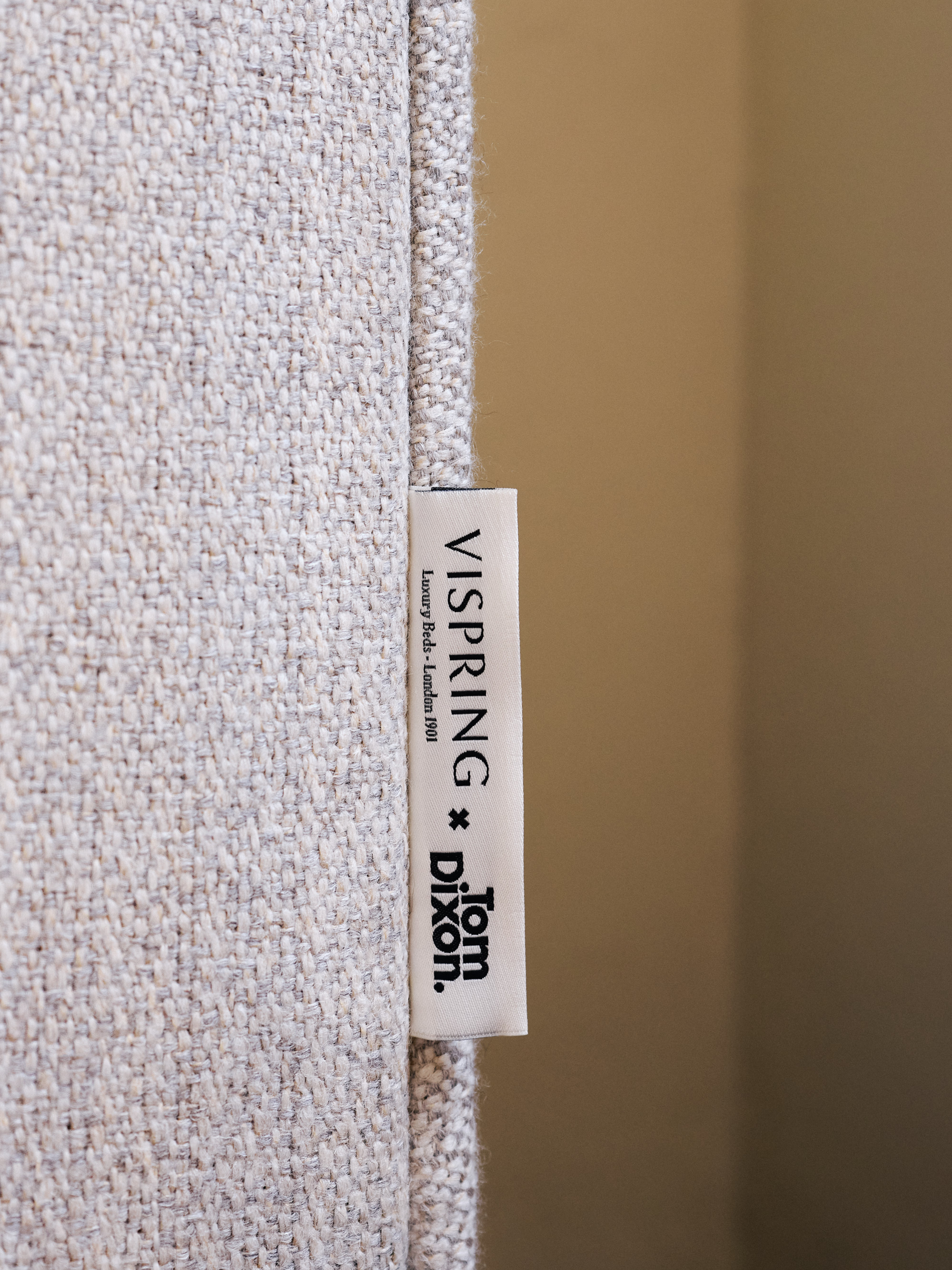 Inside Mua Mua Hotel designed by Tom Dixon for Milan Design Week 2026, featuring Tom Dixon x Vispring bed collaboration