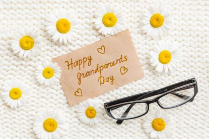 Note that says "Happy Grandparents Day" with glasses and daisies
