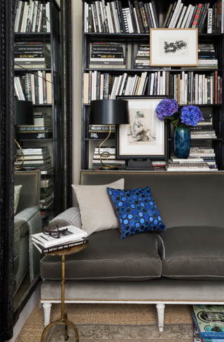 A grey reading corner of a living room