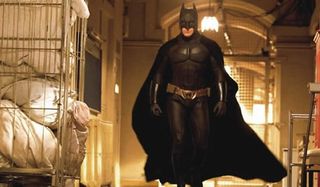 Batman Begins Christian Bale Batman strutting through Arkham