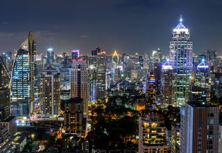 The Bangkok skyline lit up at night