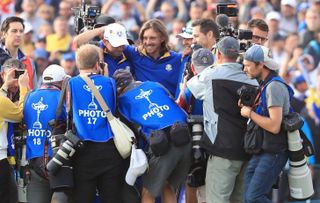 Tommy Fleetwood (centre) helped Team Europe win the 2018 Ryder Cup in Paris