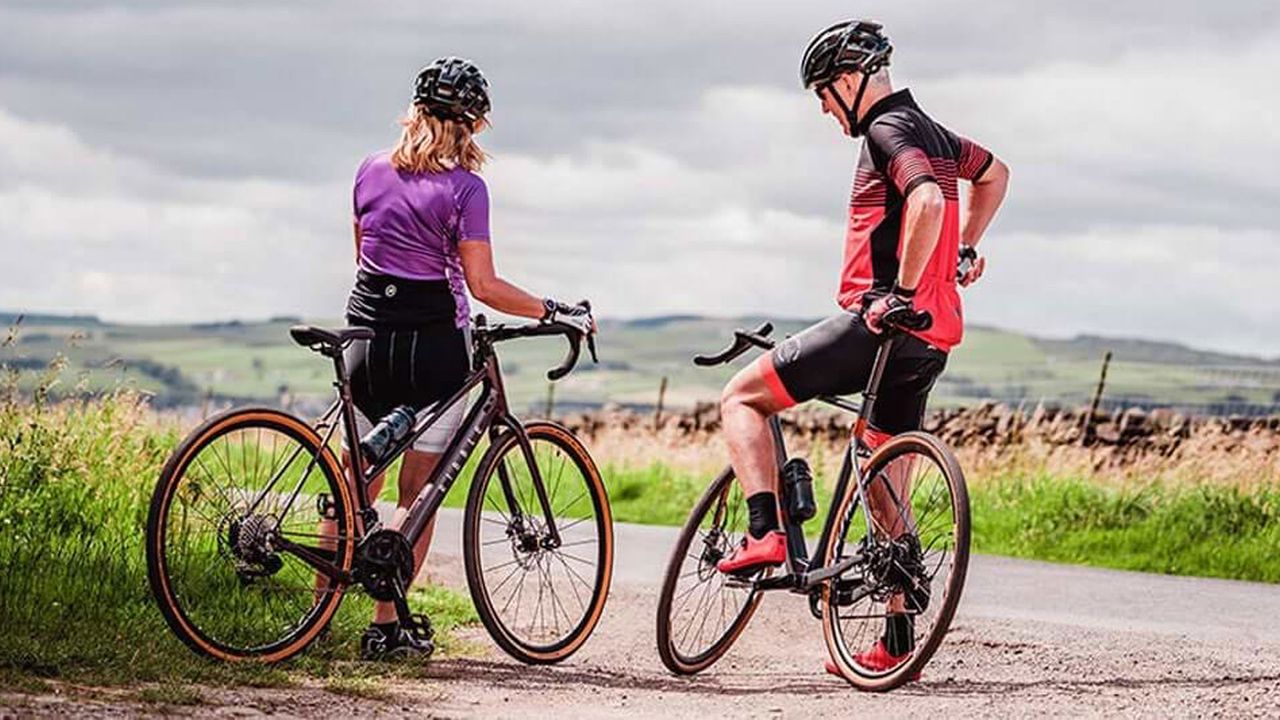 Couple cycling together