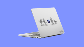 Surface Laptop with smurfs on the lid