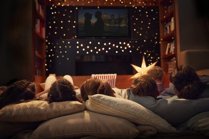 Family watching holiday movie.