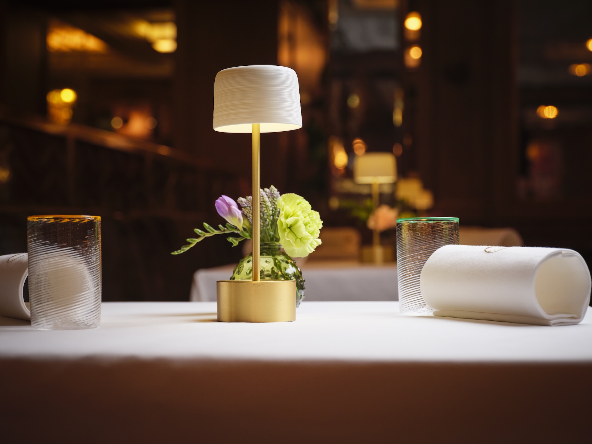 A table with a lamp on it