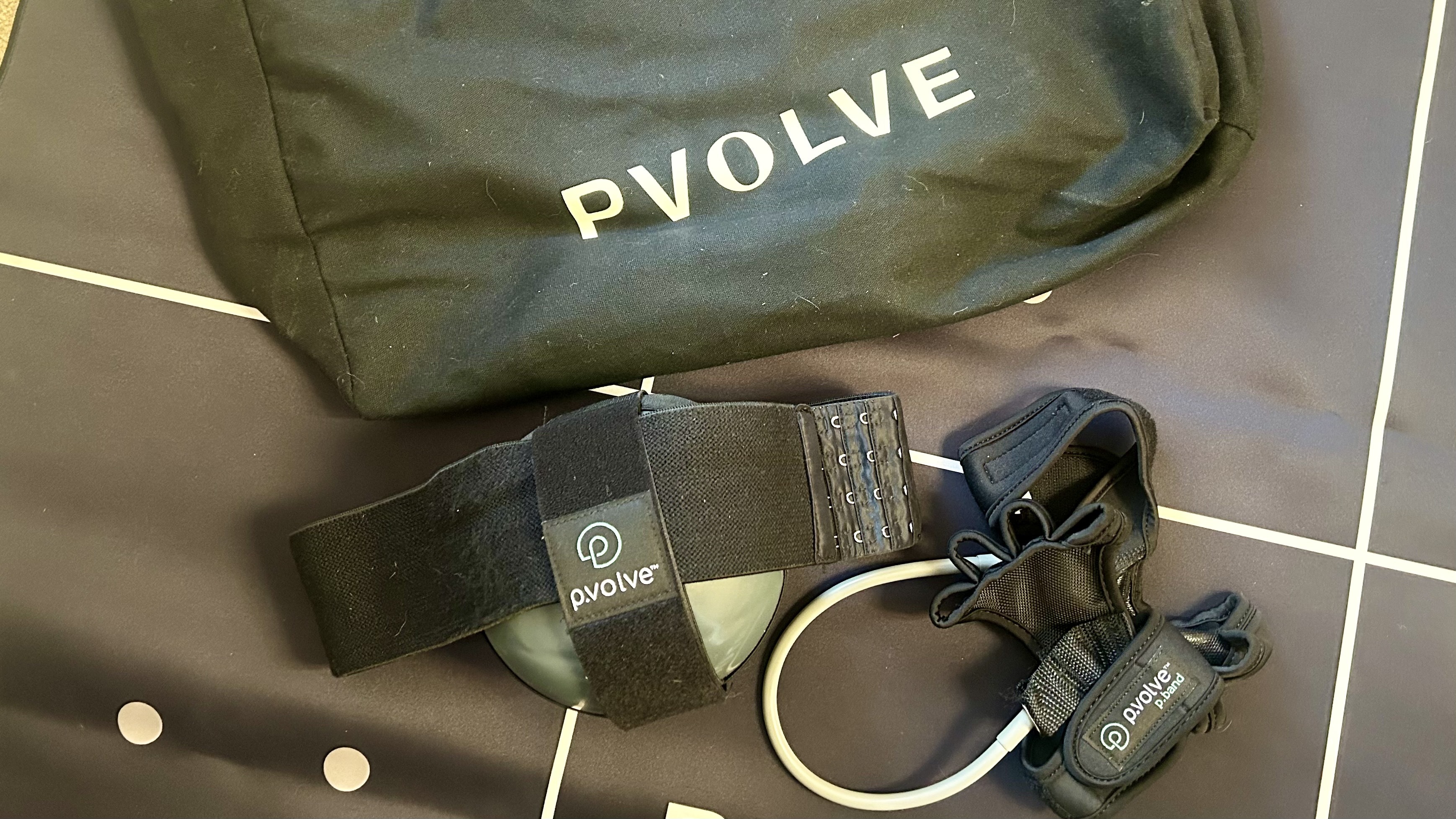 a photo of the pvolve ball, pvolve band and pvolve bag