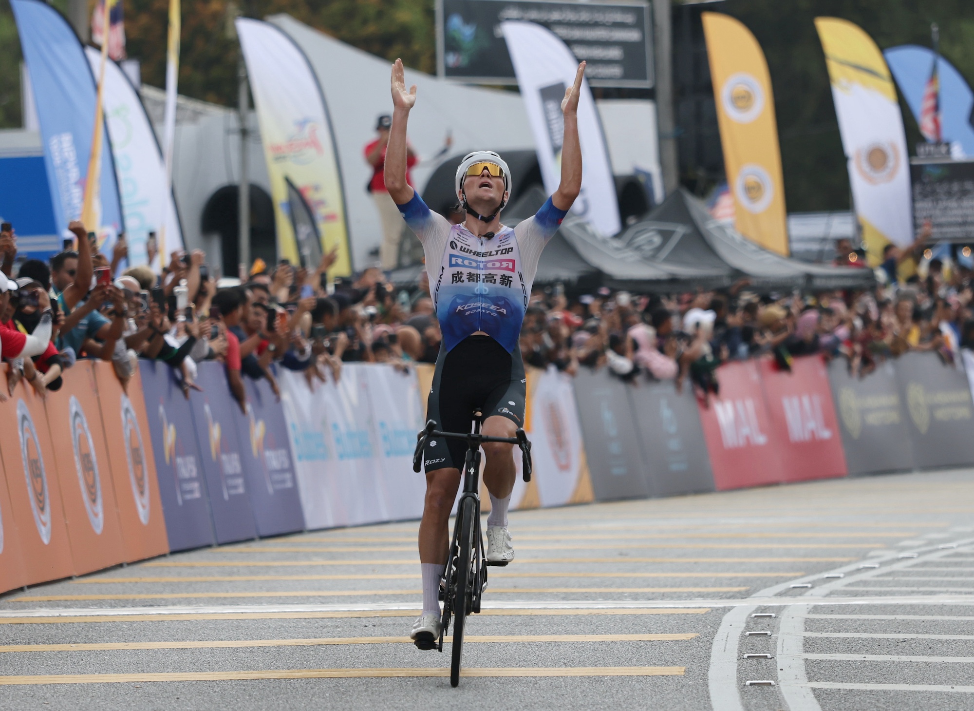 Petr Rikunov (Wheeltop Rotor Chengdu) claims victory in the Cameron Highlands on stage 4 of Le Tour de Langkawi