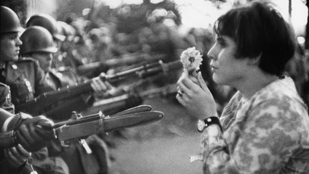 An American young girl, Jan Rose Kasmir, confronts the American National Guard outside thePentagon during the 1967 anti-Vietnam march. This march helped to turn public opinionagainst the US war in Vietnam, Washington DC, USA, 1967.© Marc Riboud / Fonds Marc Riboud au MNAAG/Magnum Photos