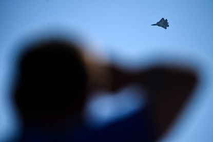 Russian fighter jet just barely misses U.S. plane. 