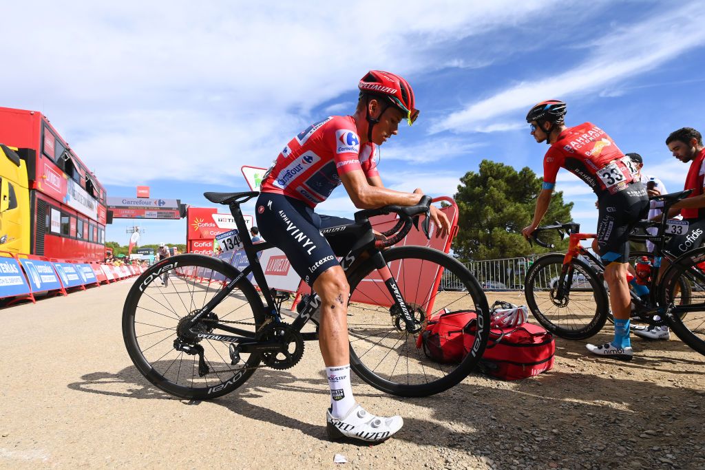 MONASTERIO DE TENTUDA SPAIN SEPTEMBER 07 Remco Evenepoel of Belgium and Team QuickStep Alpha Vinyl Red Leader Jersey reacts after the 77th Tour of Spain 2022 Stage 17 a 1624km stage from Aracena to Monasterio de Tentuda 1095m LaVuelta22 WorldTour on September 07 2022 in Monasterio de Tentuda Spain Photo by Tim de WaeleGetty Images