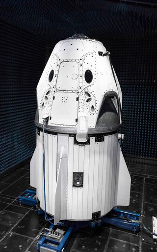 SpaceX's first Crew Dragon spacecraft undergoes electromagnetic interference testing in a giant anechoic chamber at NASA's Kennedy Space Center in Florida on May 20, 2018.
