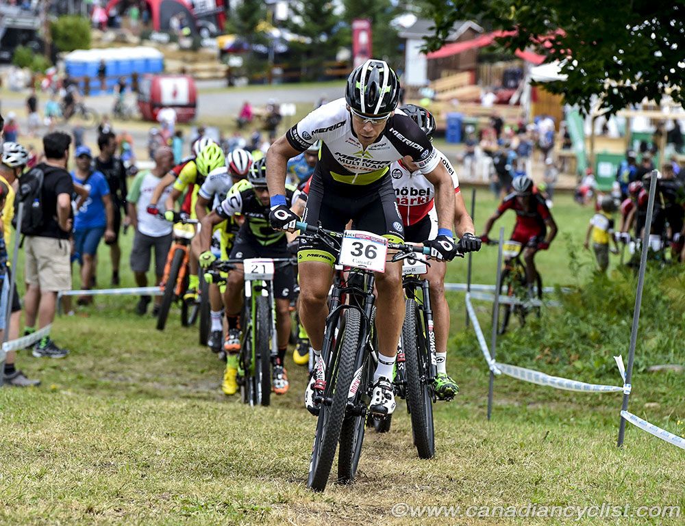 Thomas Litscher leads the field out on the start lap