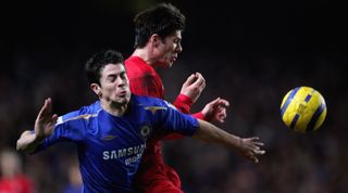 LONDON - FEBRUARY 05: Xabi Alonso of Liverpool and Asier Del Horno of Chelsea battle for the ball during the Barclays Premiership match between Chelsea and Liverpool at Stamford Bridge on February 5, 2006 in London, England. (Photo by Mike Hewitt/Getty Images)