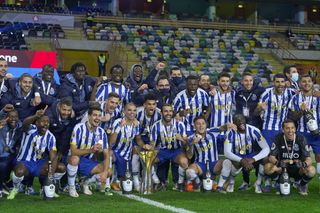 Porto players celebrate after beating Benfica to win the Portuguese Super Cup in December 2020.