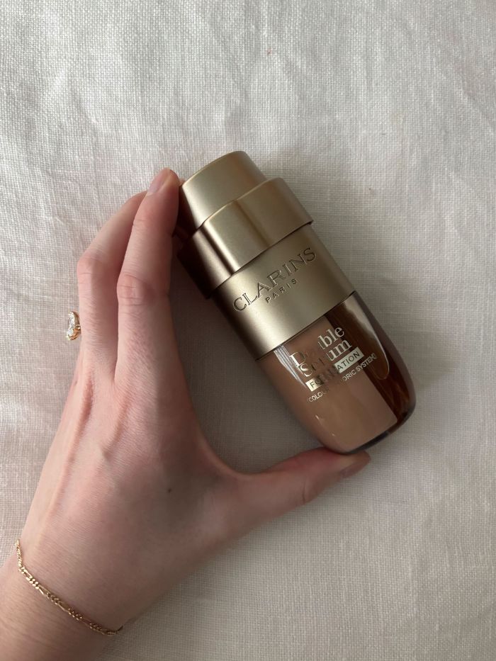 Deputy beauty editor Grace Lindsay holding the Clarins Double Serum Foundation