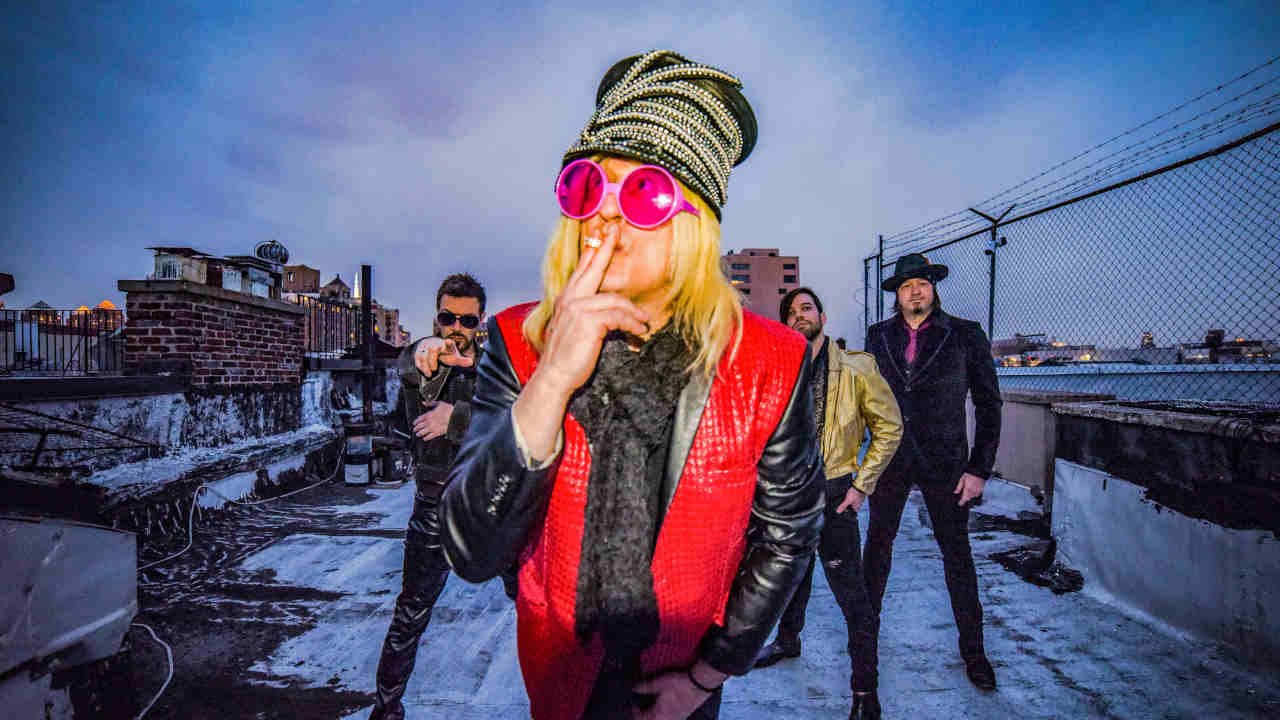 Enuff Z&amp;rsquo;Nuff posing for a photograph in 2018