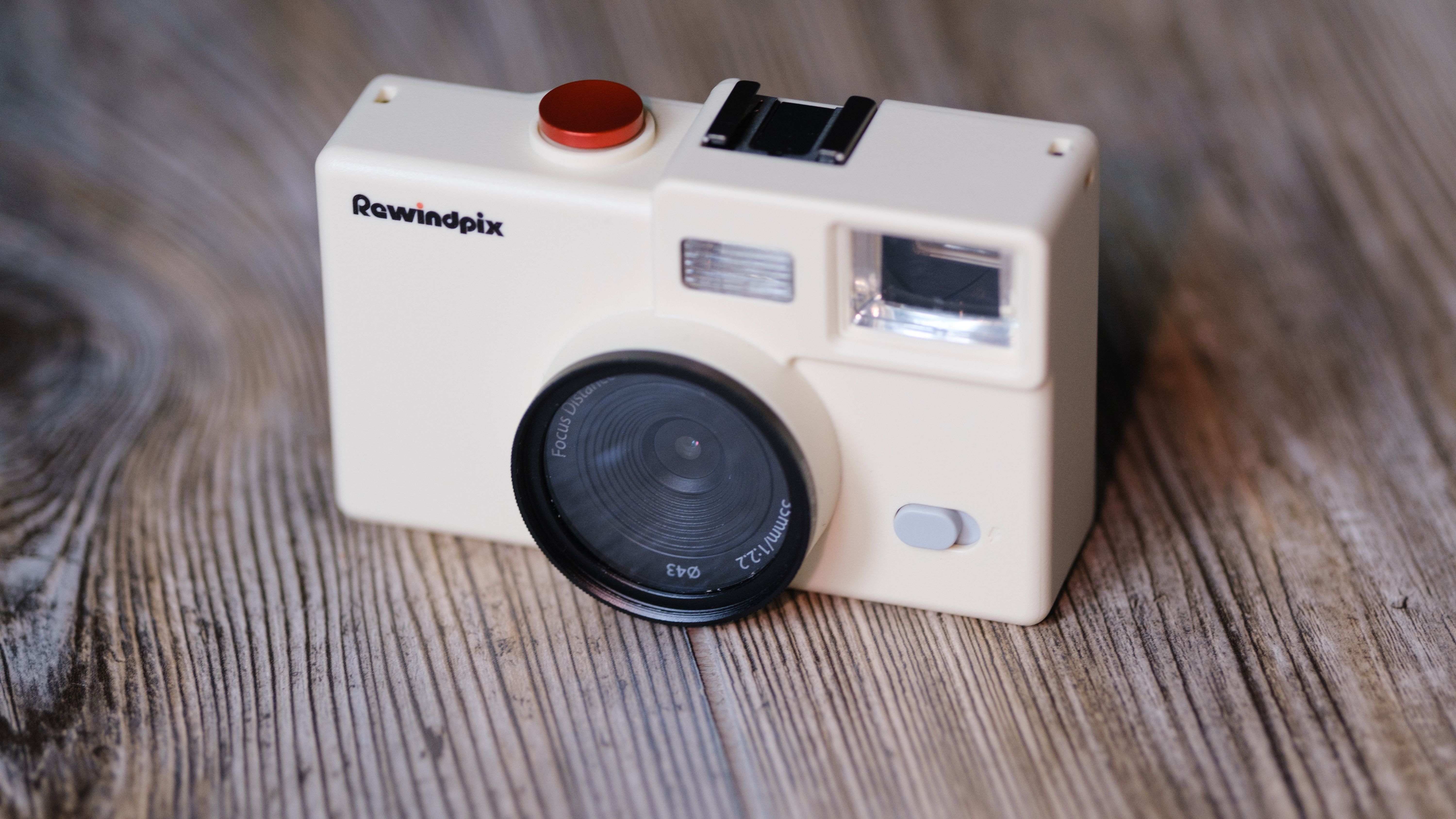 The Rewindpix on a wood background