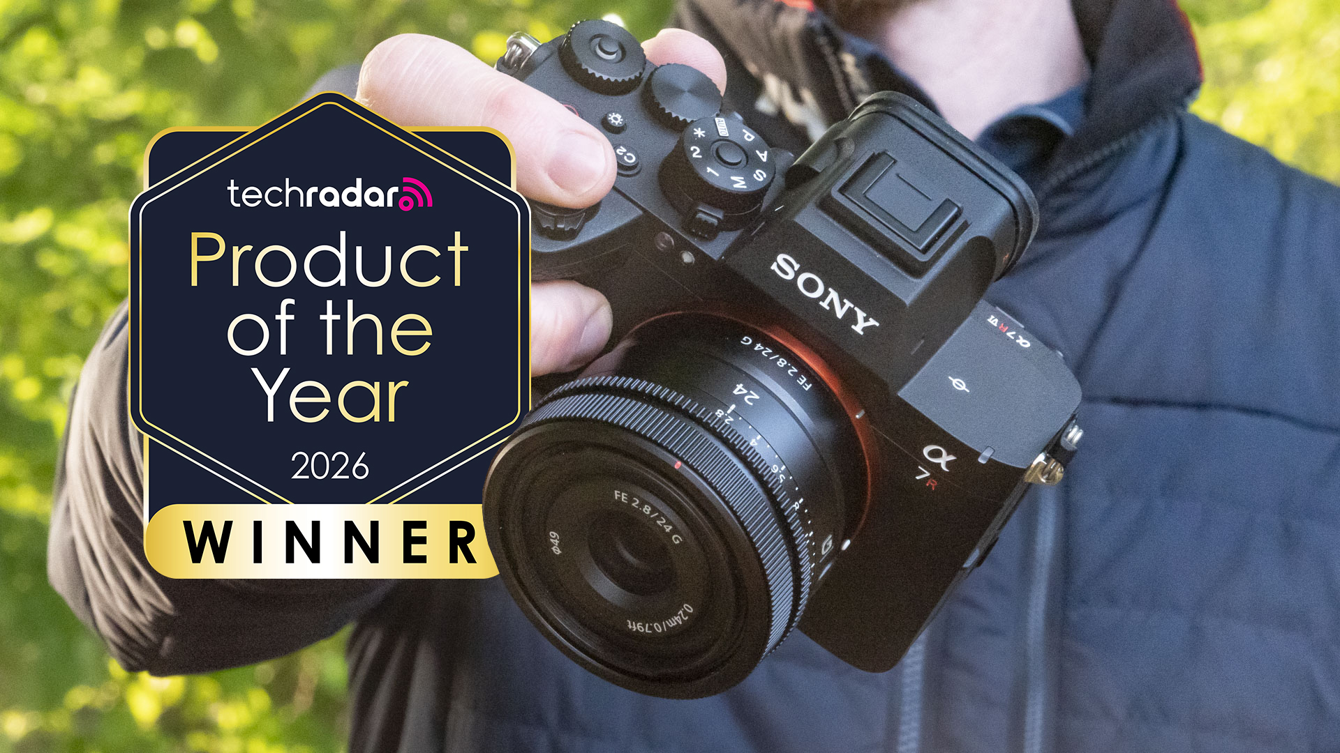 A Man holding the Sony A7R VI camera, with a logo saying "TechRadar Product of the Year 2026 winner"