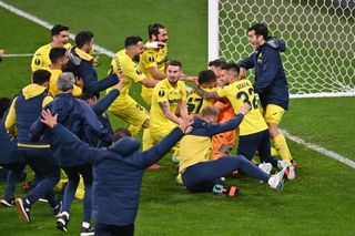 Villarreal players celebrate victory over Manchester United in the 2021 Europa League final.