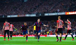 Lionel Messi celebrates after scoring his first goal against Athletic Club for Barcelona in the 2015 Copa del Rey final at Camp Nou.