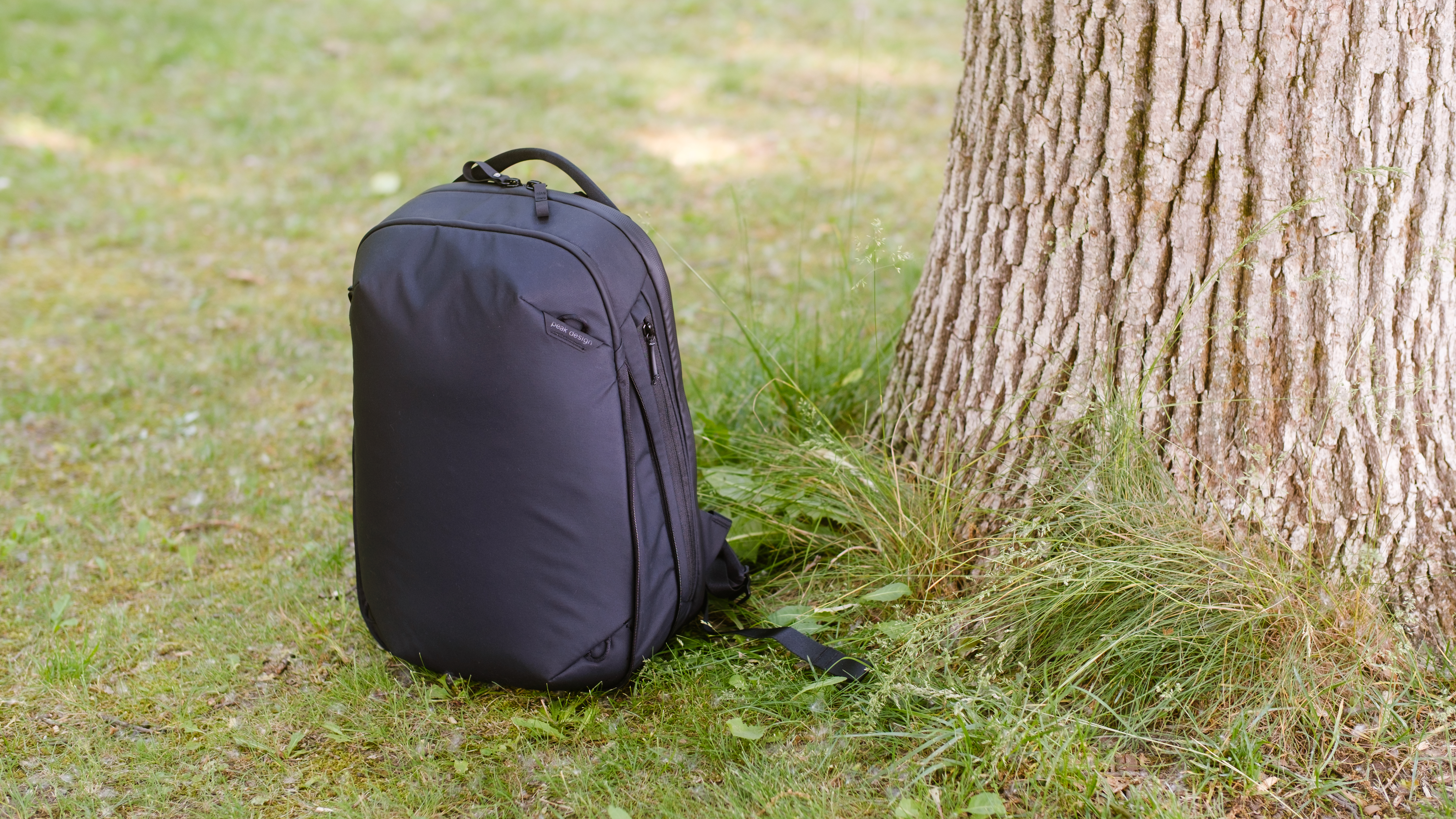 The Peak Design Travel Backpack 20L in use by a photographer
