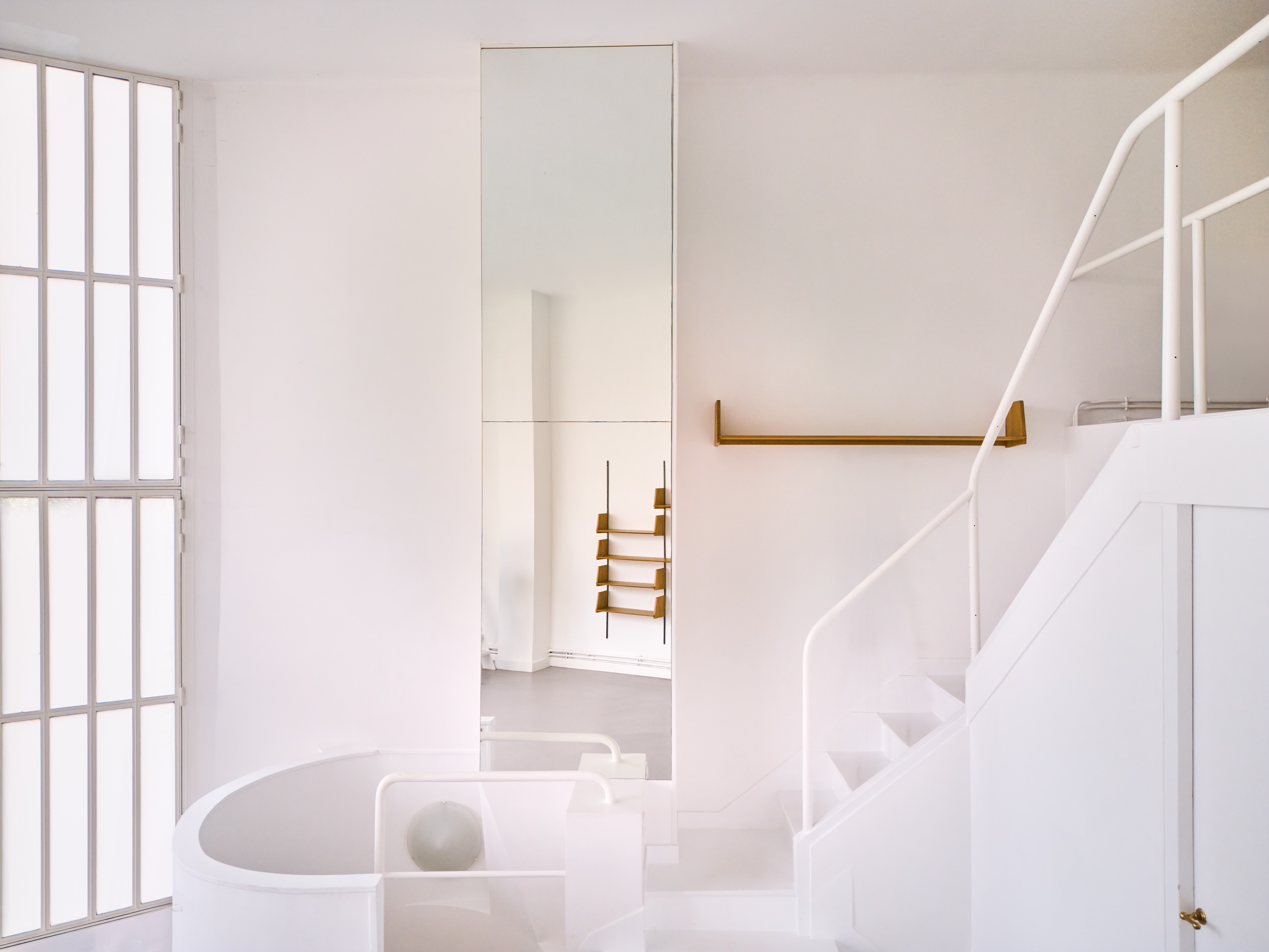 all-white interior of Le Corbusier&#039;s Maison-Atelier Ozenfant,