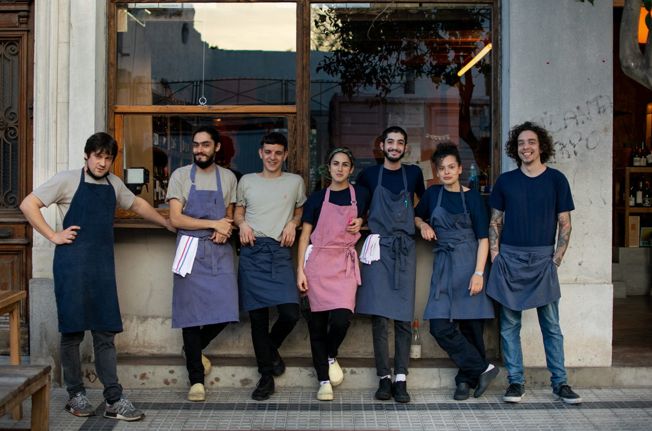 Restaurant team standing outside their bar