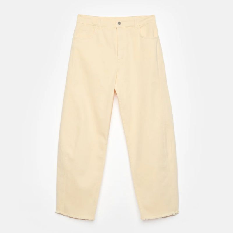 A cutout of yellow barrel leg jeans by Mint Velvet