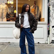 Influencer wears Gola trainers.