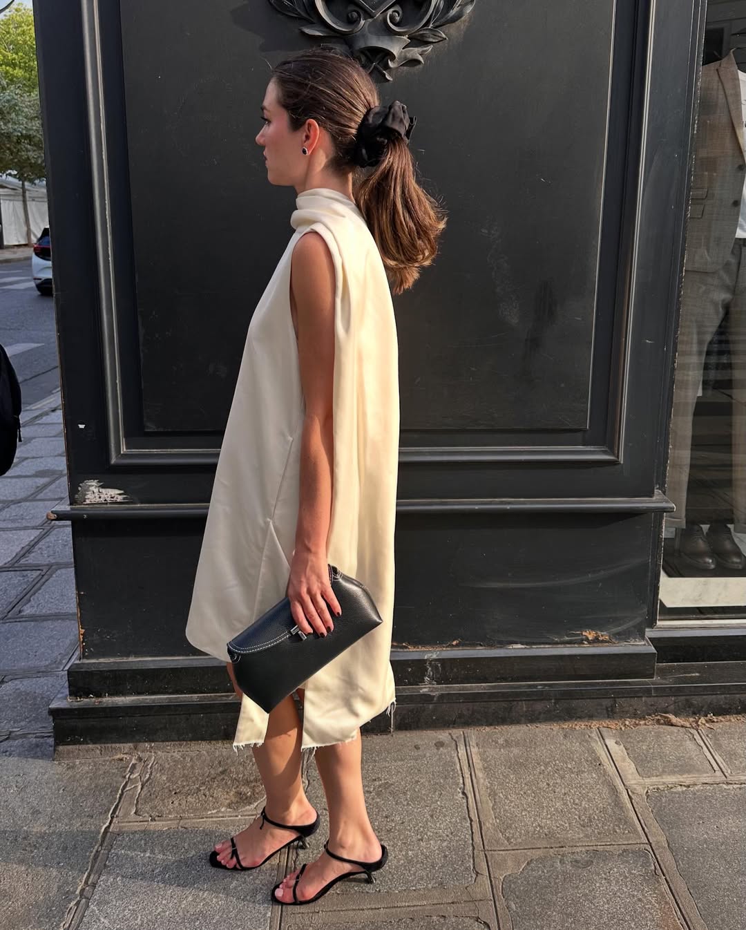 Ilirida in a dress and kitten heel sandals