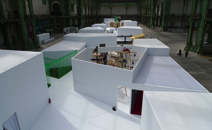 Wooden objects within a white walled nest