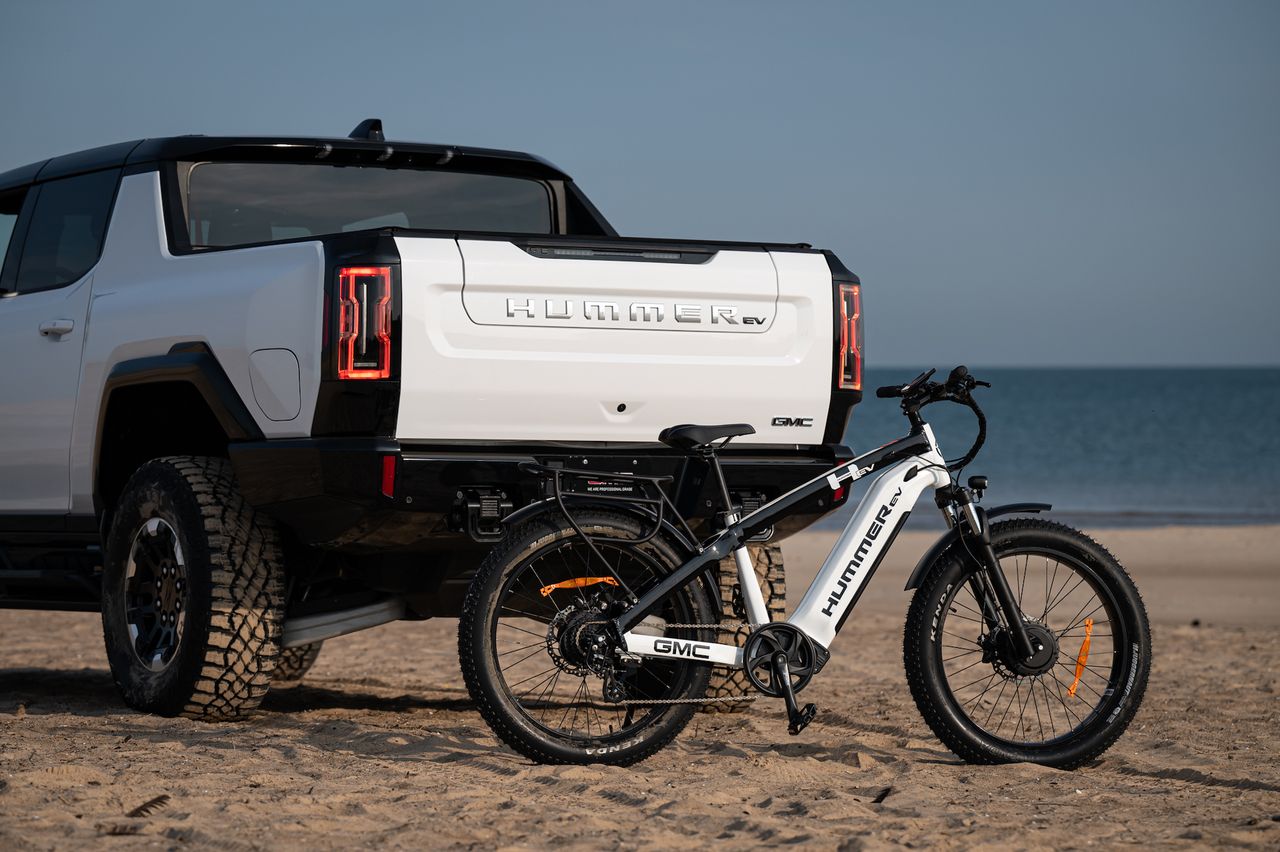 The Hummer EV Bicycle and Hummer EV truck side by side