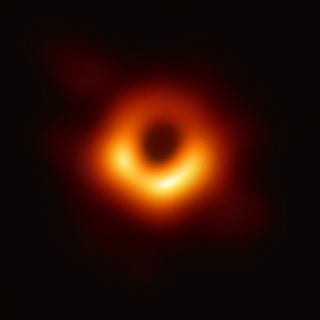 Matter swirling into the supermassive black hole at the center of M87.