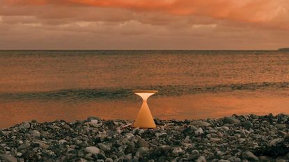 Portable light on the beach at sunset