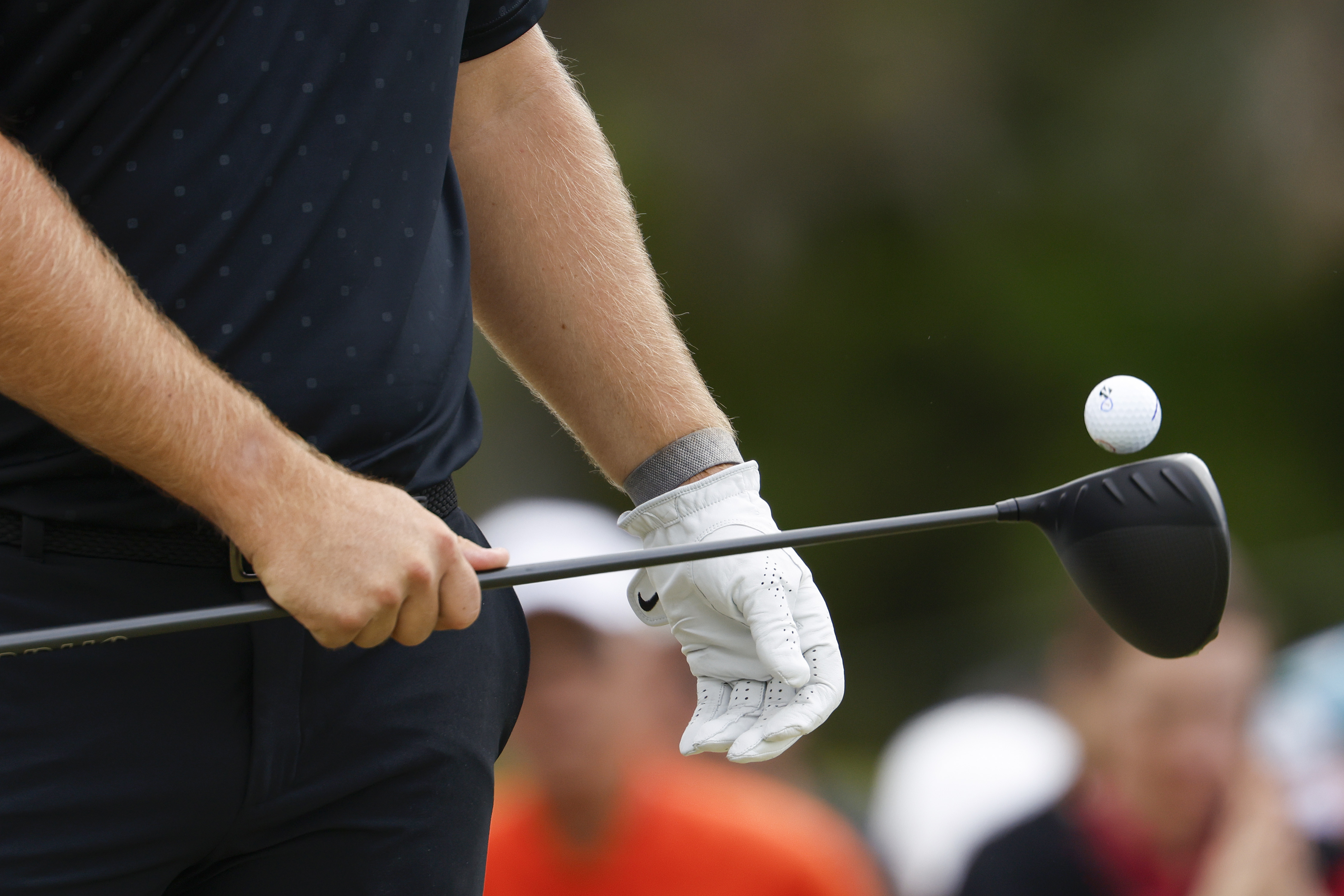 Chris Gotterup bounces a golf ball on his driver