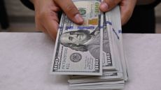 A stack of $100 bills