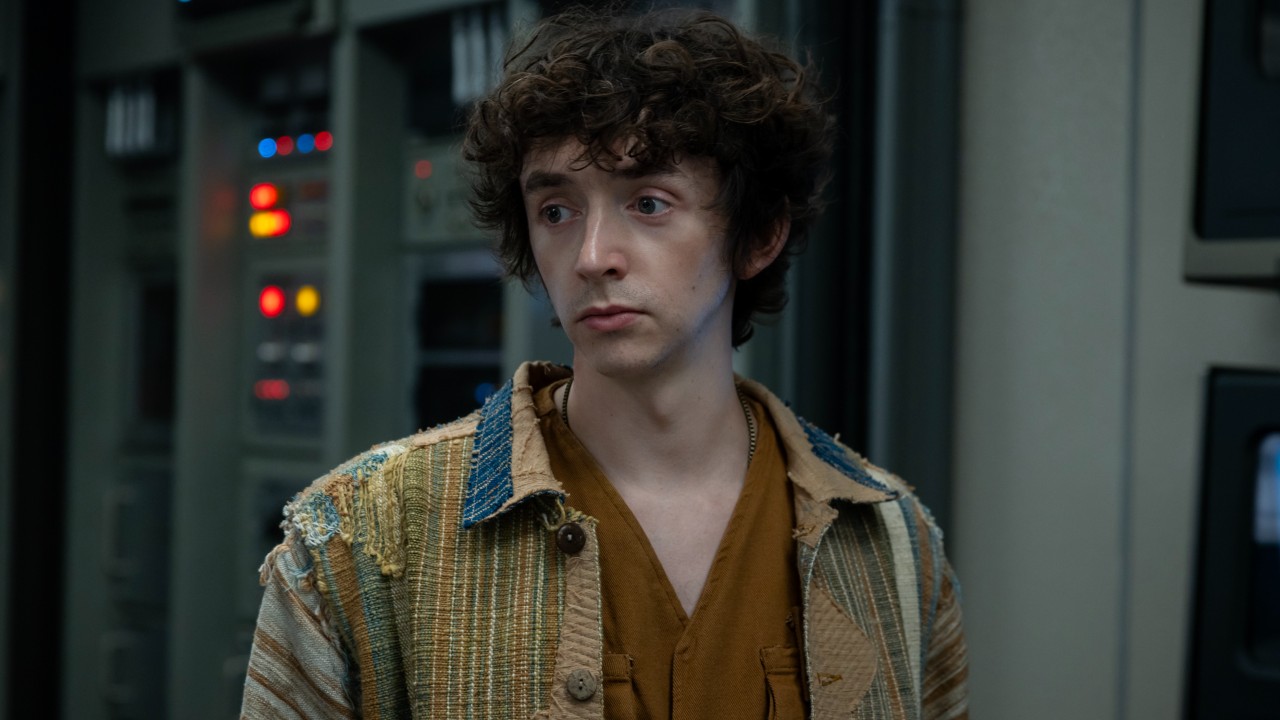 Boy Kavalier standing in a room
