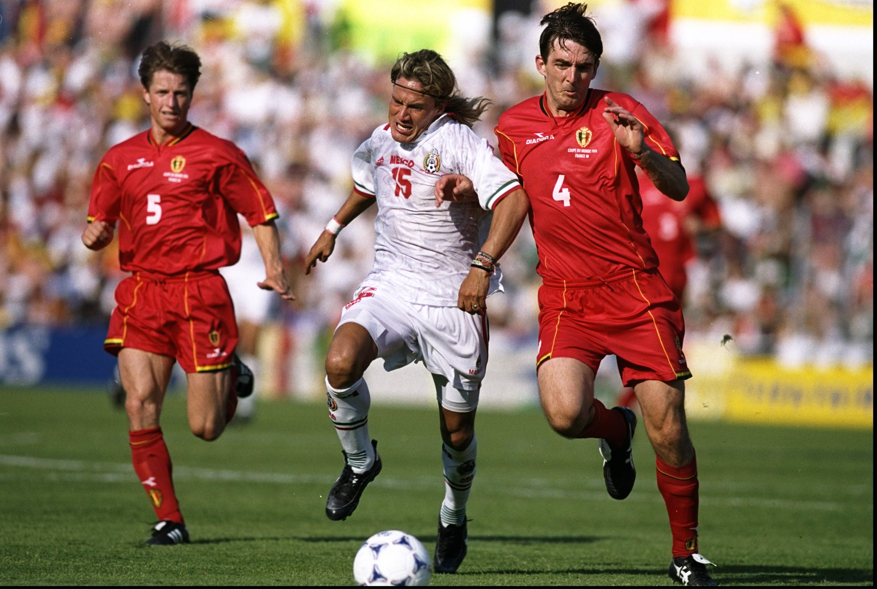 Belgium (in red) in action against Mexico at the 1998 World Cup in France.