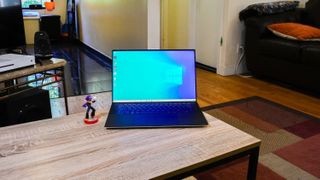 Dell XPS 15 (2020) on a wooden coffee table