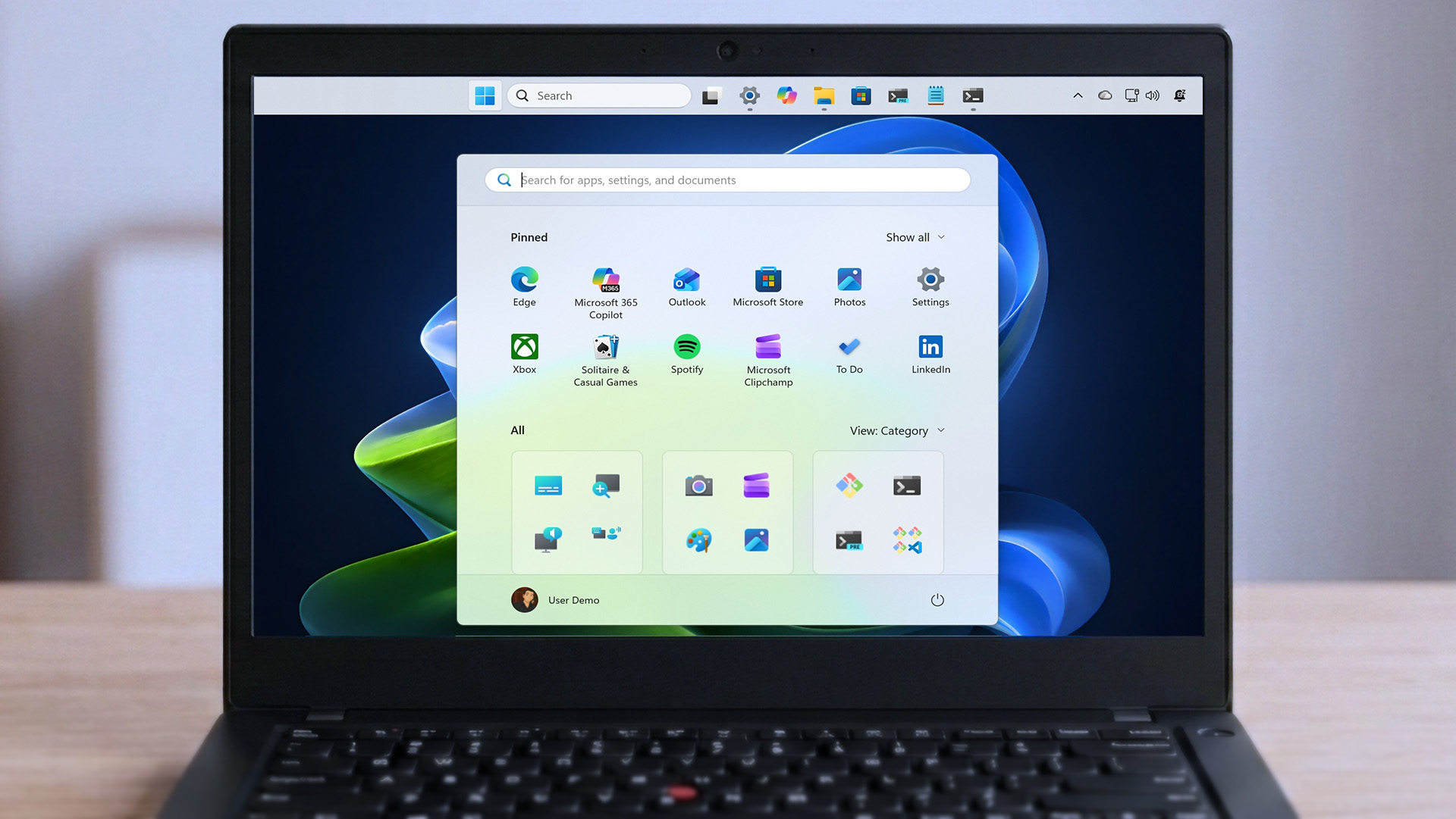 Lenovo ThinkPad laptop with Windows 11 using a top-mounted Taskbar