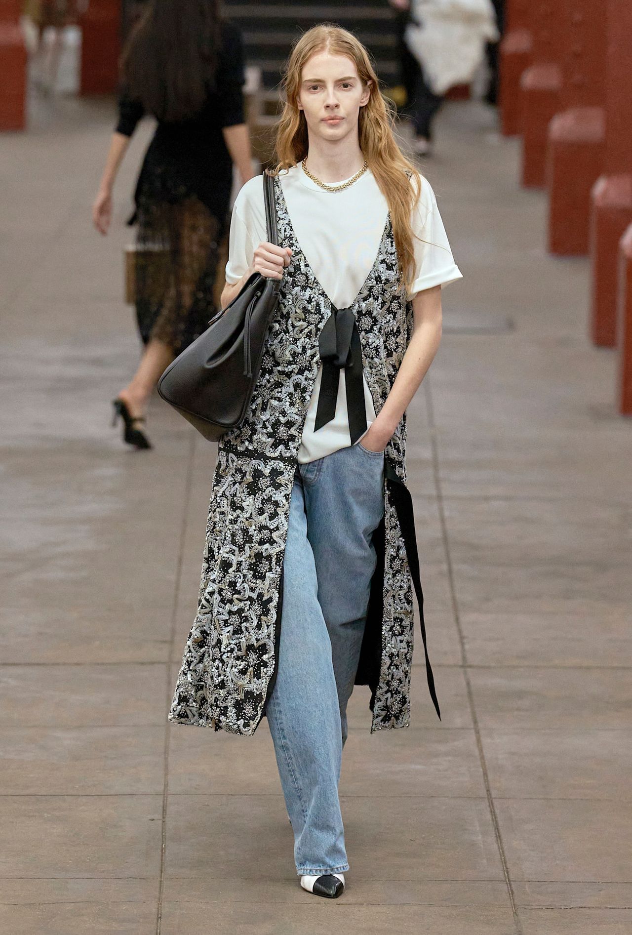 models walk the subway runway for the chanel metiers d'art 2026 show in new york city