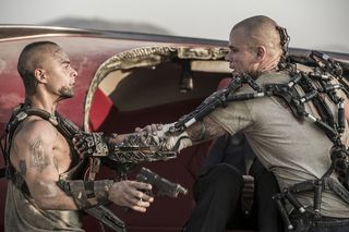 Matt Damon (right) and Jose Pablo Cantillo in Columbia Pictures' 'Elysium'