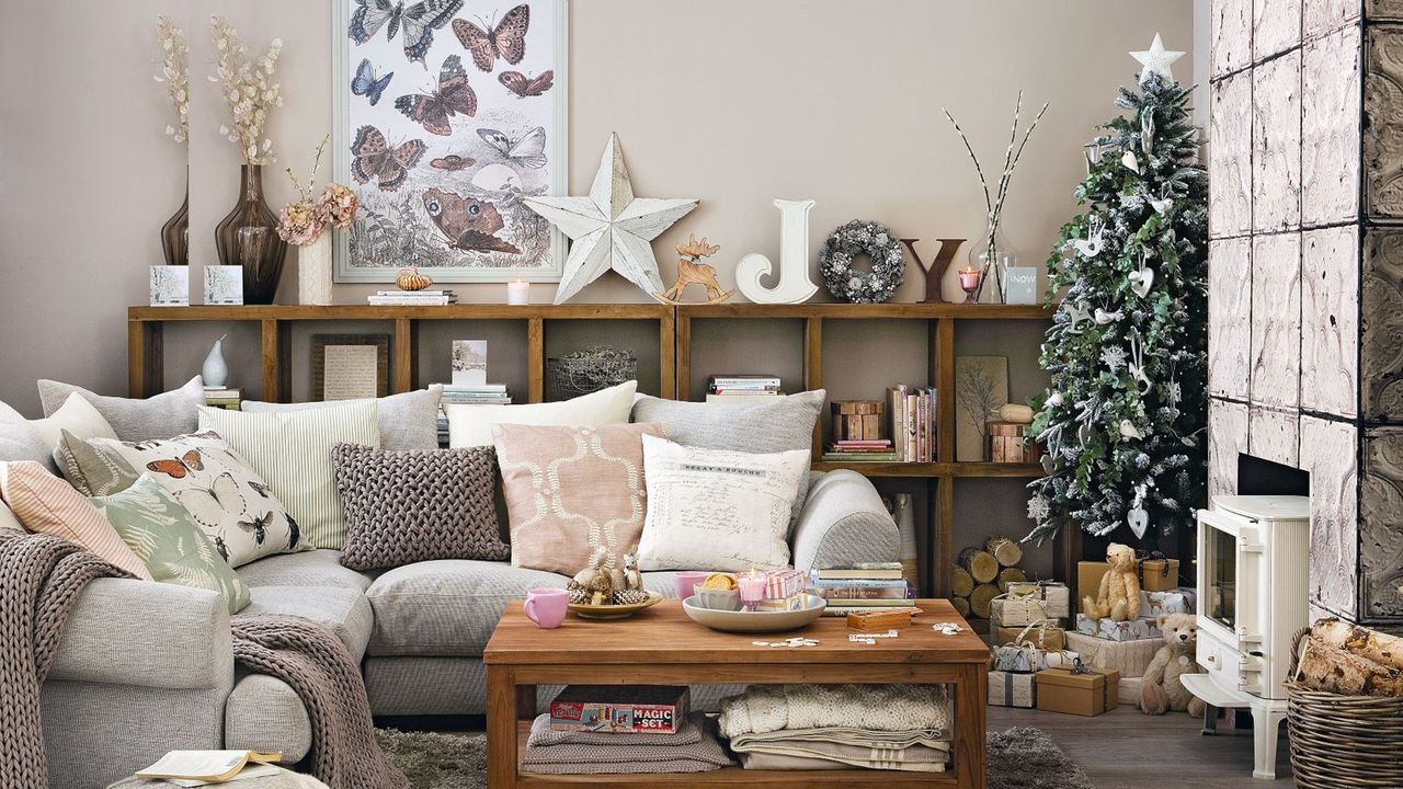 Decorated Christmas tree with presents in living room