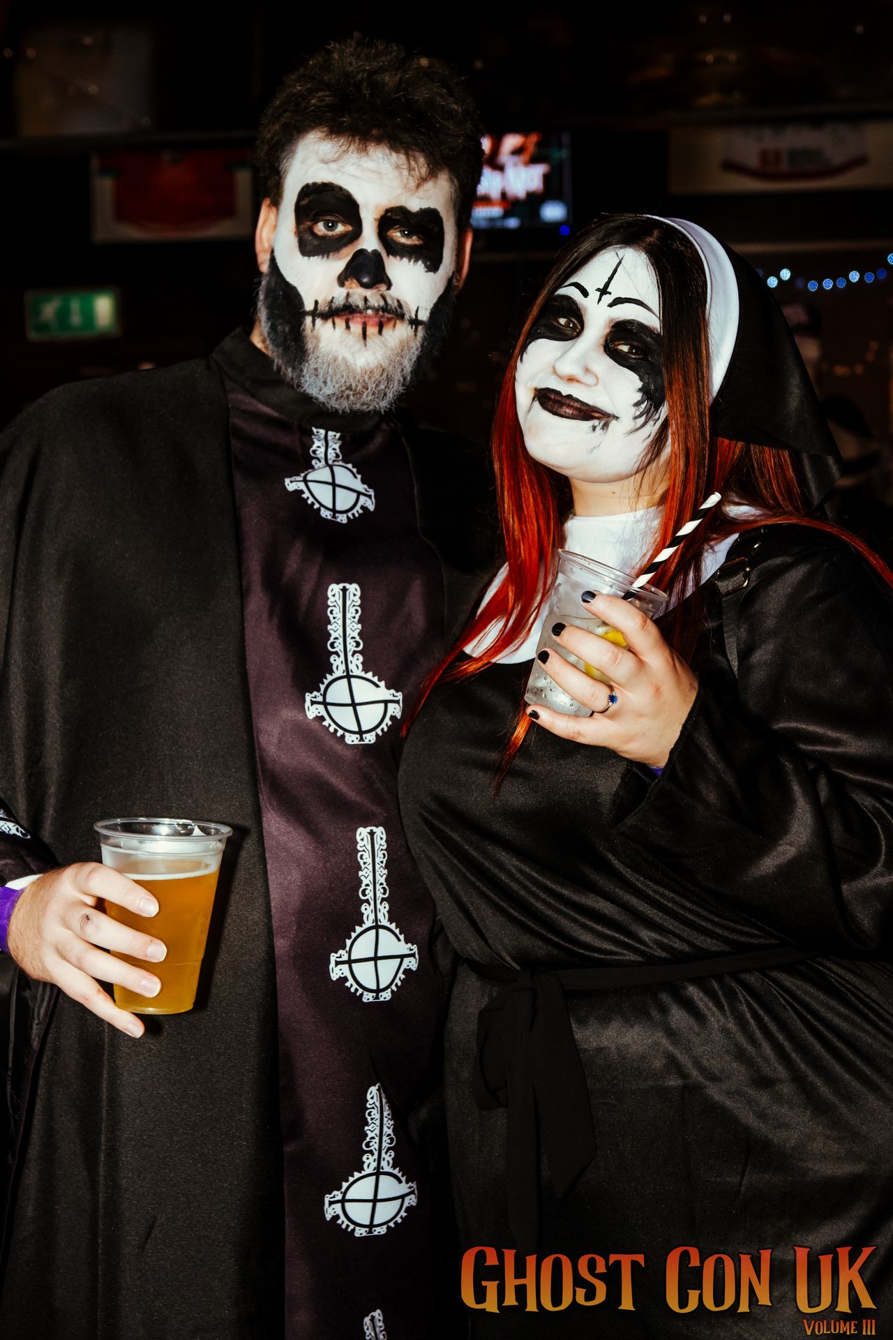 A couple in ghost fancy dress